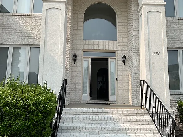 Brick stairs to front-door entrance