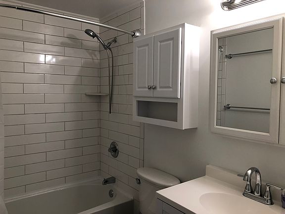 New tub and tile surround installed 2022.