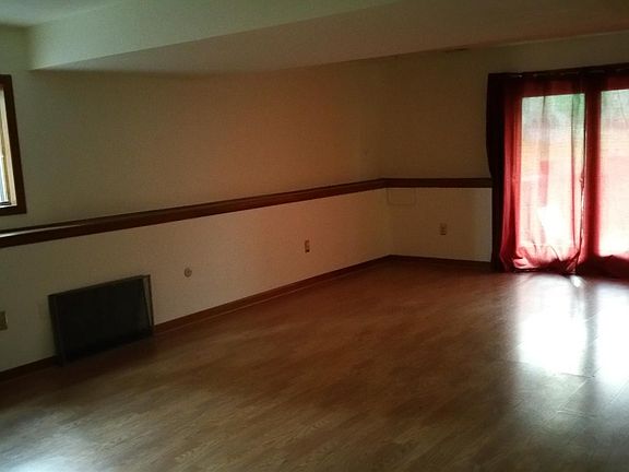 Partial view (2 of 2) of living & dinning room area (unfurni