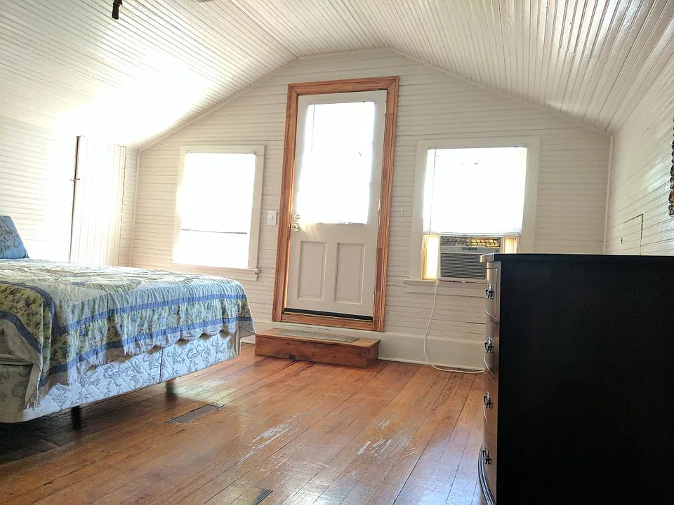 main room, door to deck photo before furnishings