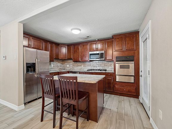 3rd image of 10702 Duncum St