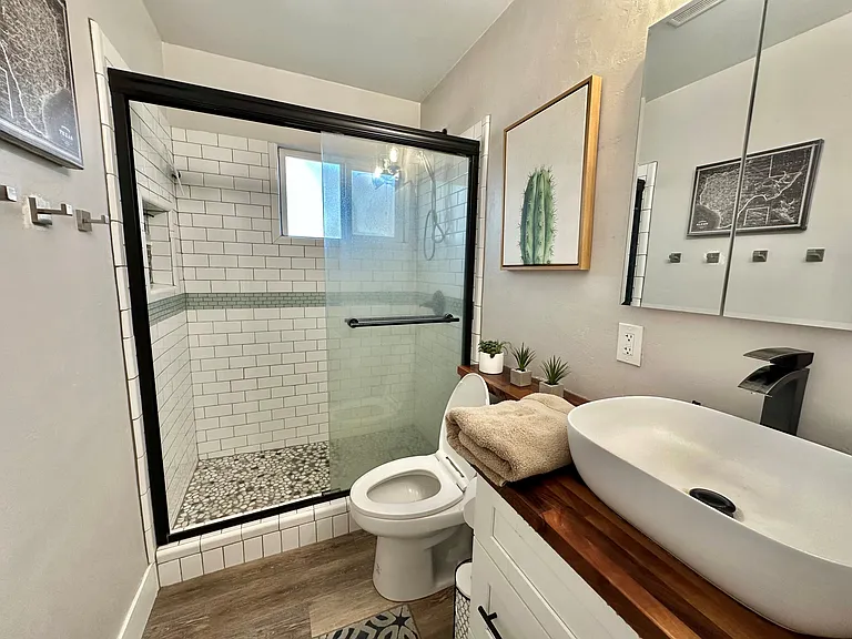 main bathroom with large shower and new hardware