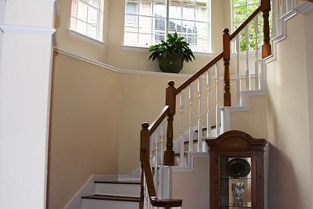 Large beautiful windows line staircase
