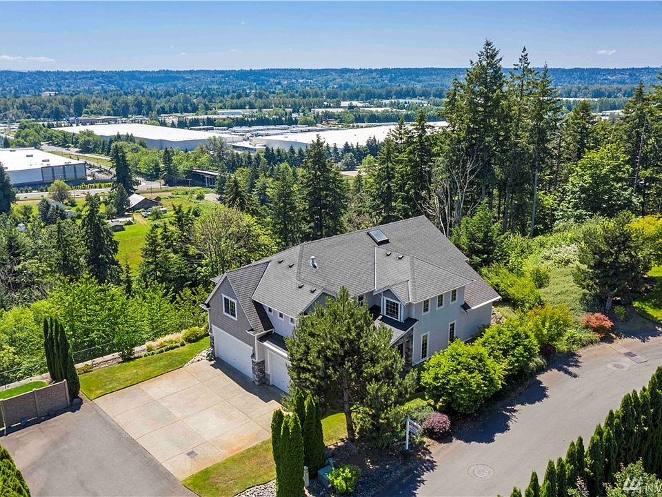 Tucked away on a private cul de sac in convenient Edgewood, this stunning property offers privacy & beautiful valley views!  Shy 3000 sq foot home offers 3 car finished garage, ample parking, 4 bedrooms plus big bonus and main floor den.  Exquisite finishes, soaring ceilings, gleaming hardwoods.  Beautiful home!