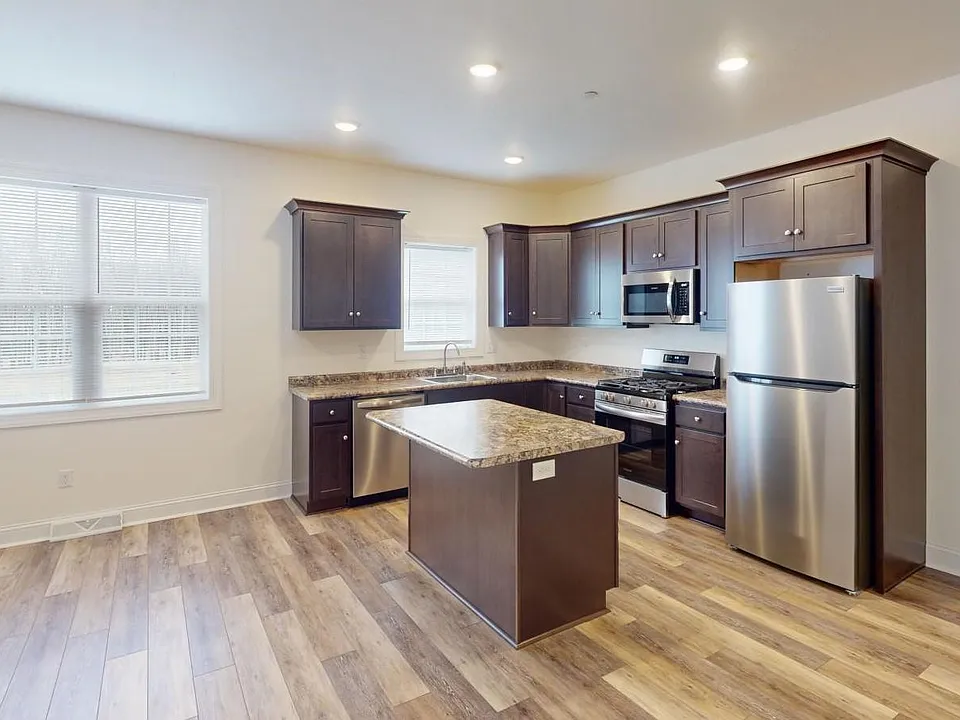 Kitchen w Island Looking to Living Rm Area