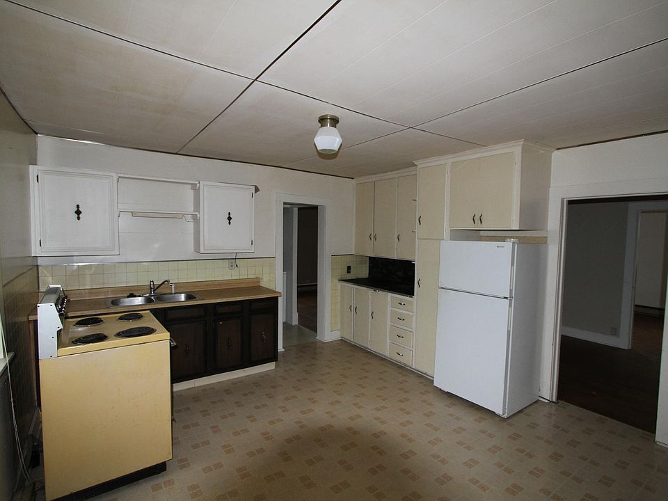 Kitchen (Dated but functional). Large 13 x 14 space. Laundry