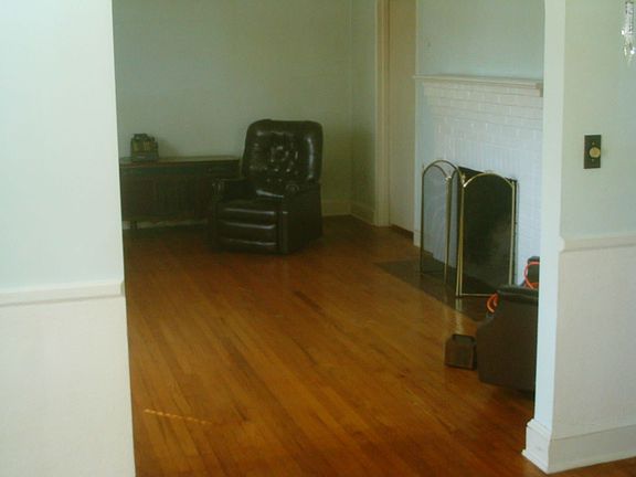 From the formal dining room, into the living room.