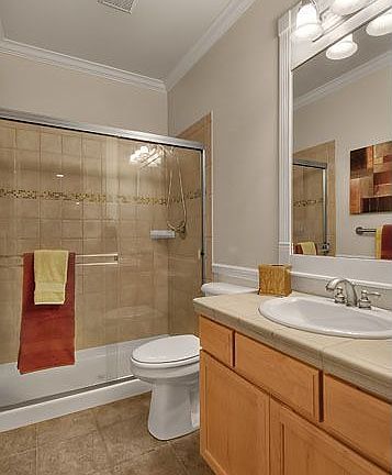 Main floor bathroom WITH SHOWER right next door to the den.