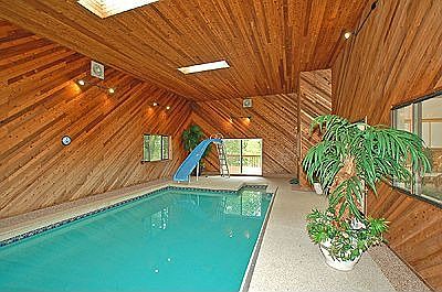 32' x 15.5' pool room with skylights & vaulted ceiling
