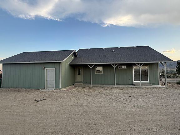 Back side of house. Slider is into the master bedroom