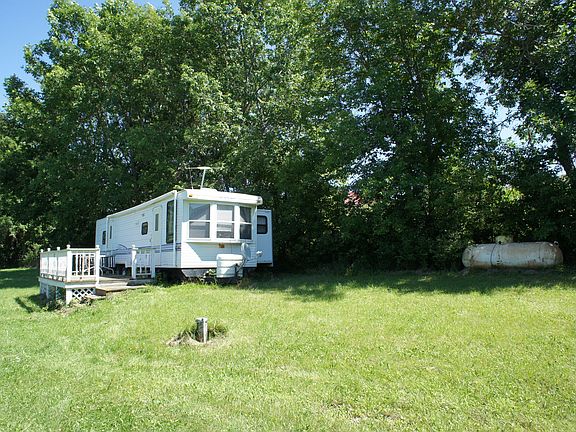 Camper w/deck, well,propane