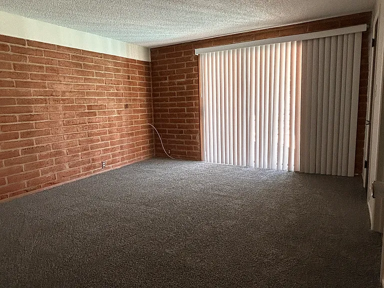 Primary bedroom with sliders going to gazebo