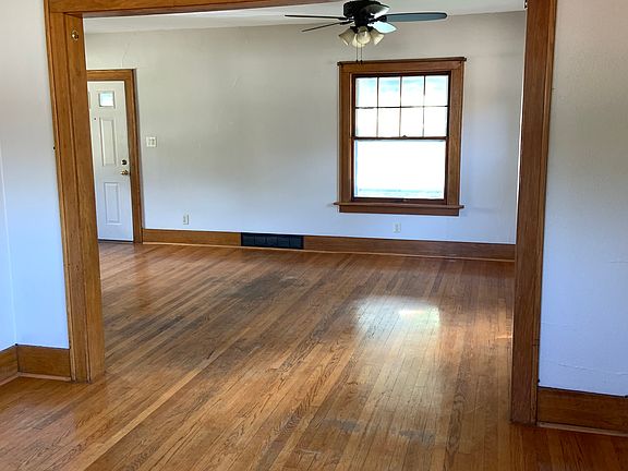 Photo from dining room into living room and front door.