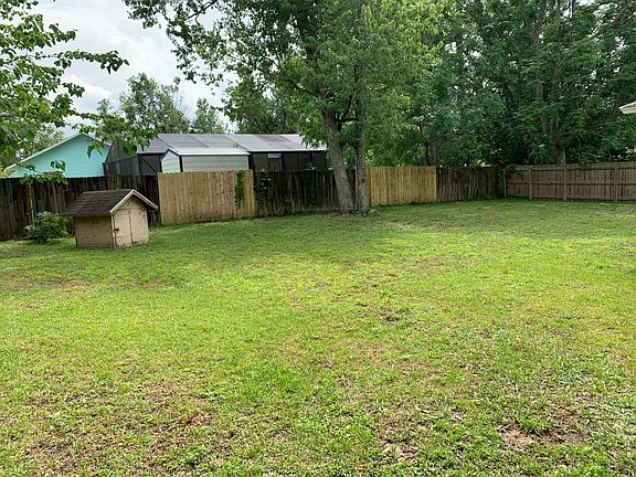 Back yard and water pump house