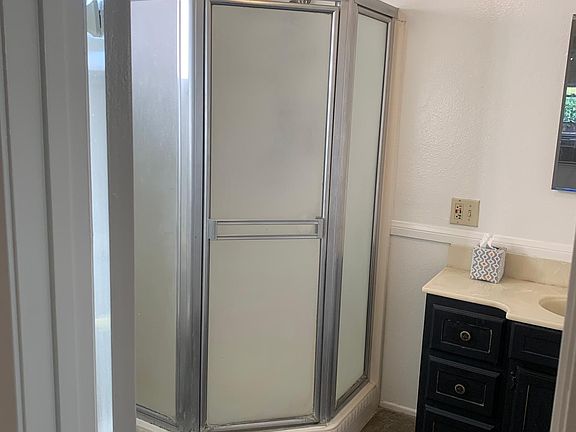 Bathroom off master bedroom w slate floor