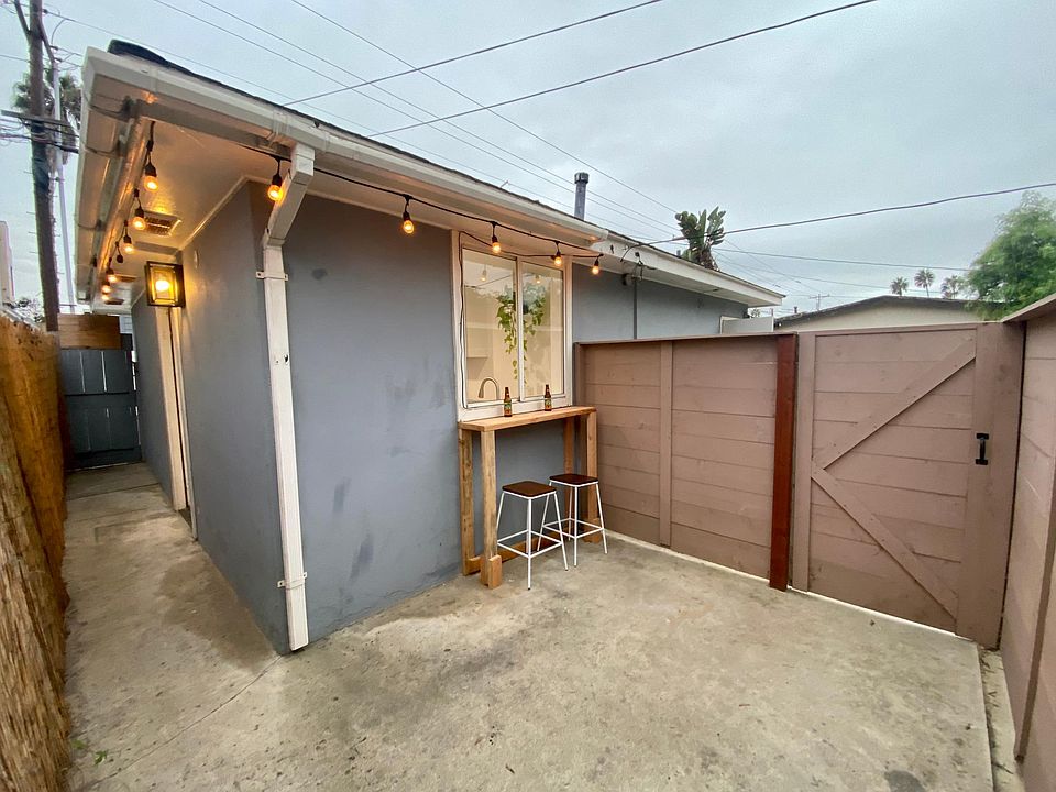 Private entrance with private fenced outdoor patio