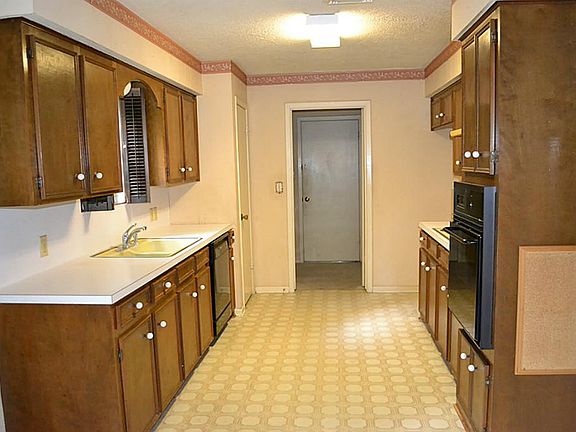 Laundry room at end of kitchen