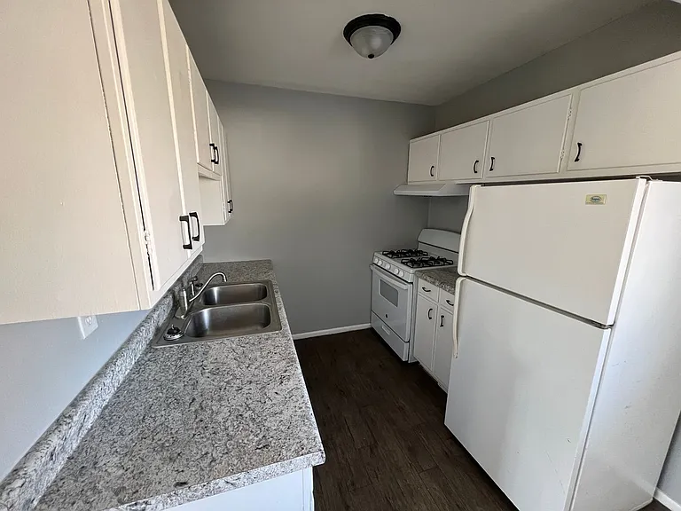 Village Apartments — Photo 10