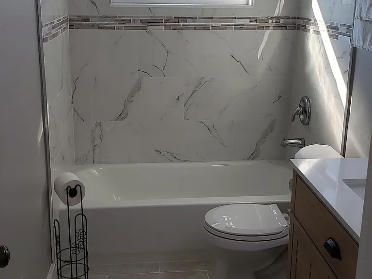 New Remodeled Bathroom Shower, New Vanity and New Tub/Faucets Looking In.