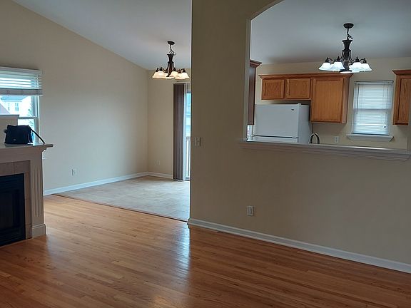 Family room on upper level with gas fireplace