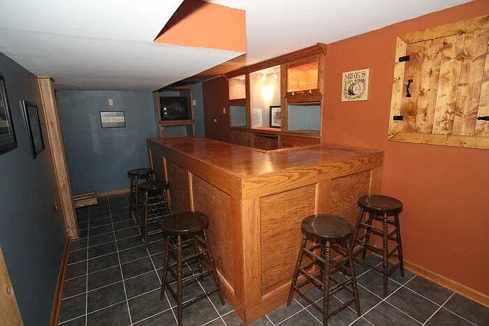Finished basement with large bar