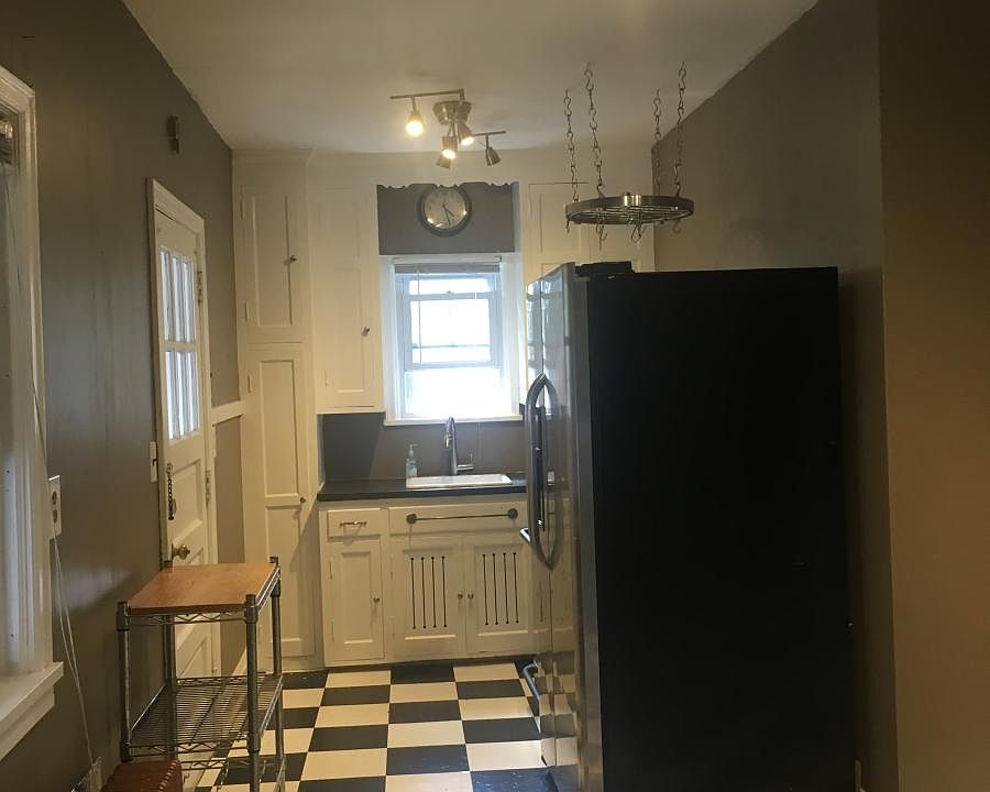 Eat in kitchen with new stainless steel appliances