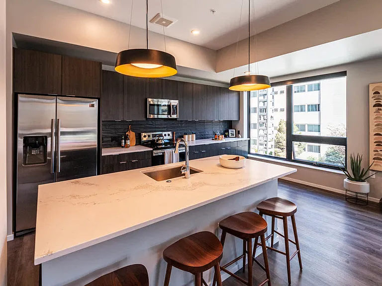 Kitchen with Stainless Steel Appliances and Breakfast Bar