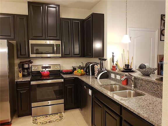 Beautiful upgraded kitchen with granite, stainless steel, and upgraded cabinets.