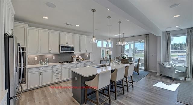 1st image of 8104 Woodland Ct #13