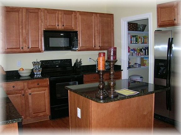 Ktichen with Granite Counters and walk-in pantry!