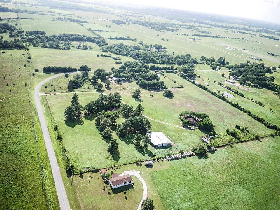 17 Acres on Betka Rd in the 290 ~ Grand Pkwy corridor area. Property includes custom built home, and