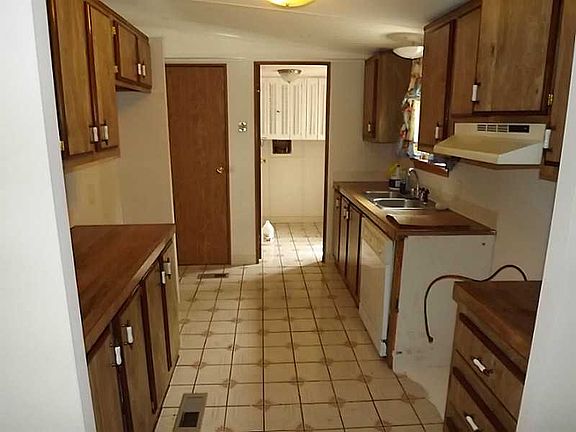 Kitchen looking into mud roo