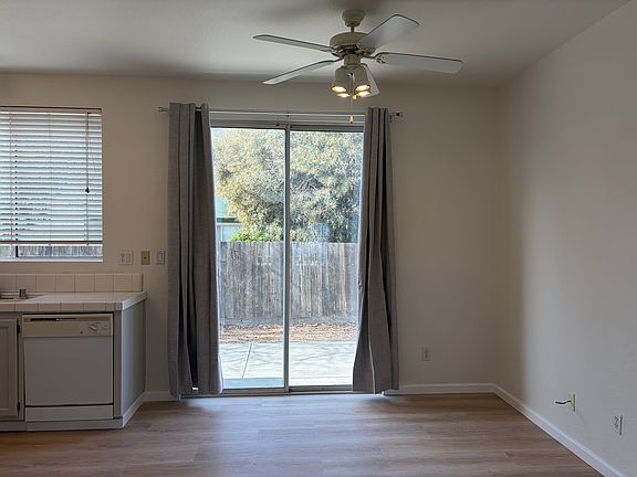 Kitchen dining area which opens out to backyard area.