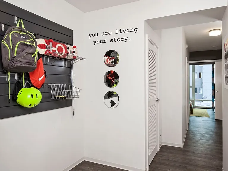 Hallway with customizable gear wall