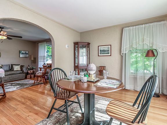 LIVING ROOM WITH VIEW OF DINING ROOM AND ENTRY FOYER