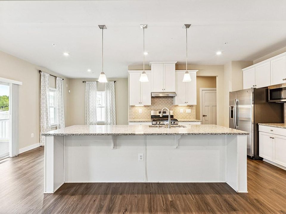 Welcome home to this gorgeous former model home with all the top-of-the-line upgrades