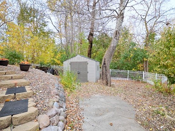 Fenced in Yard and Shed