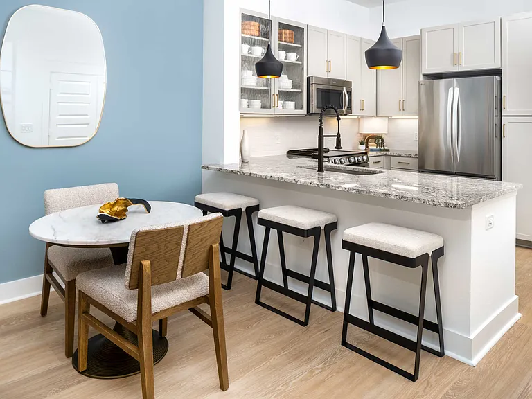 Luxury vinyl plank flooring in renovated kitchens, bathrooms, and living/dining areas