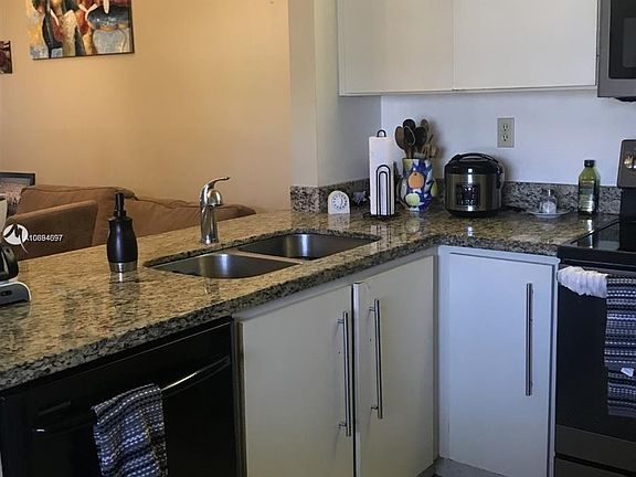 4th image of 458 NE 210th Circle Ter APT 202-8