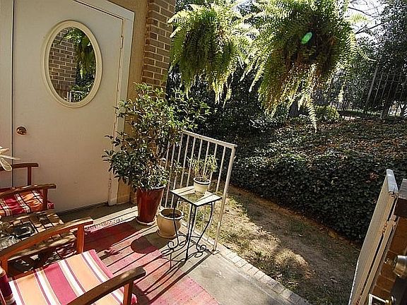 The patio opens to a grassy area- perfect for pets.