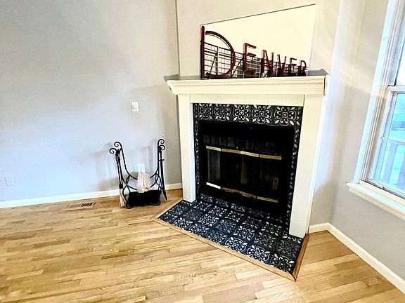 Living room with fireplace (Denver picture not included)