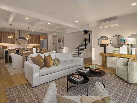 Great room concept for entertaining with oak engineered hardwoods