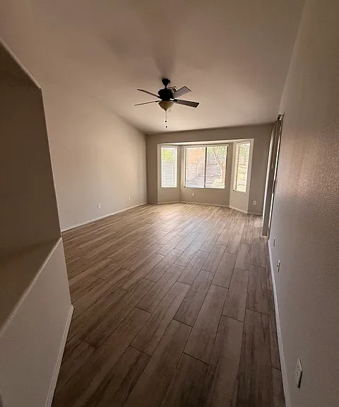 Large Master bedroom with sliding door to backyard patio. Ensuite bathroom with large walk-in closet and shower/tub.