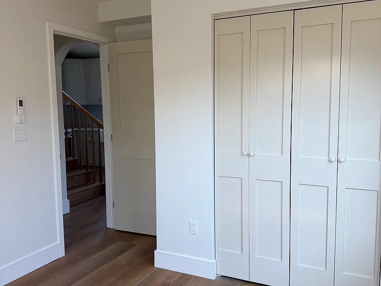 downstairs bedroom, custom closet doors