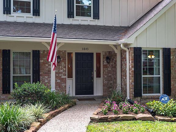 The long covered front porch is a great spot for morning coffee or watching the neighborhood activity.