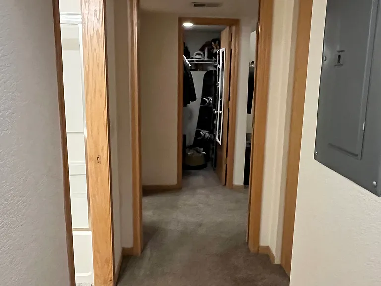 Looking down hallway from livingroom toward back bedroom