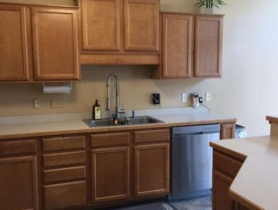 Maple cabinets allow for plenty of storage in this spacious kitchen.