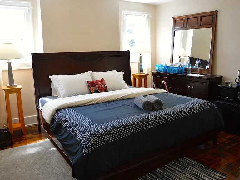 Primary Bedroom with King Bed, Dresser & Natural Light