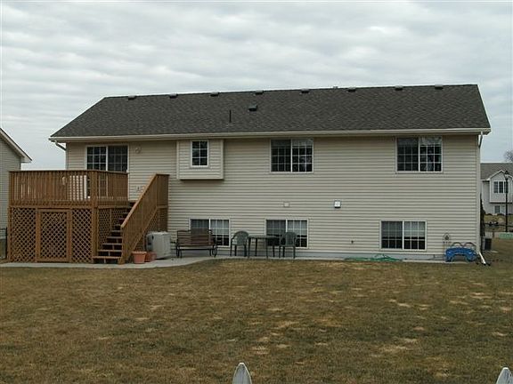 Large fenced back yard with great deck!