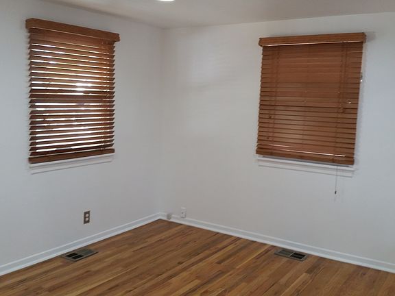 Living Room w/ 2 large windows
